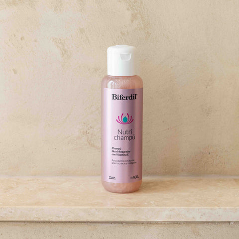 Nutri-Champú Reparador con Vitamina "E" 400 ml